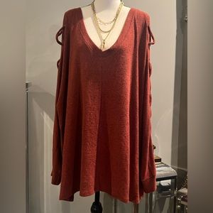 Cutest neck with side slits going down shoulders and  arms